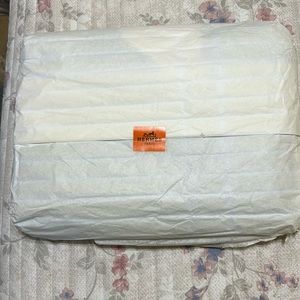 Blue/cream authentic Hermes beach towel. 60” long X 36” high. NWT